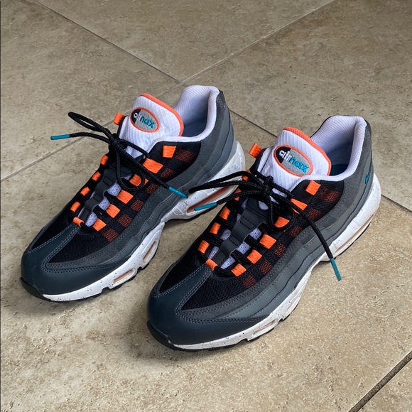 Nike Black and Orange Sneakers with Dynamic Design - Picture 1 of 16
